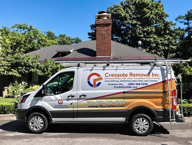 Marblehead Chimney Sweep technician removing creosote safely in Marblehead, MA